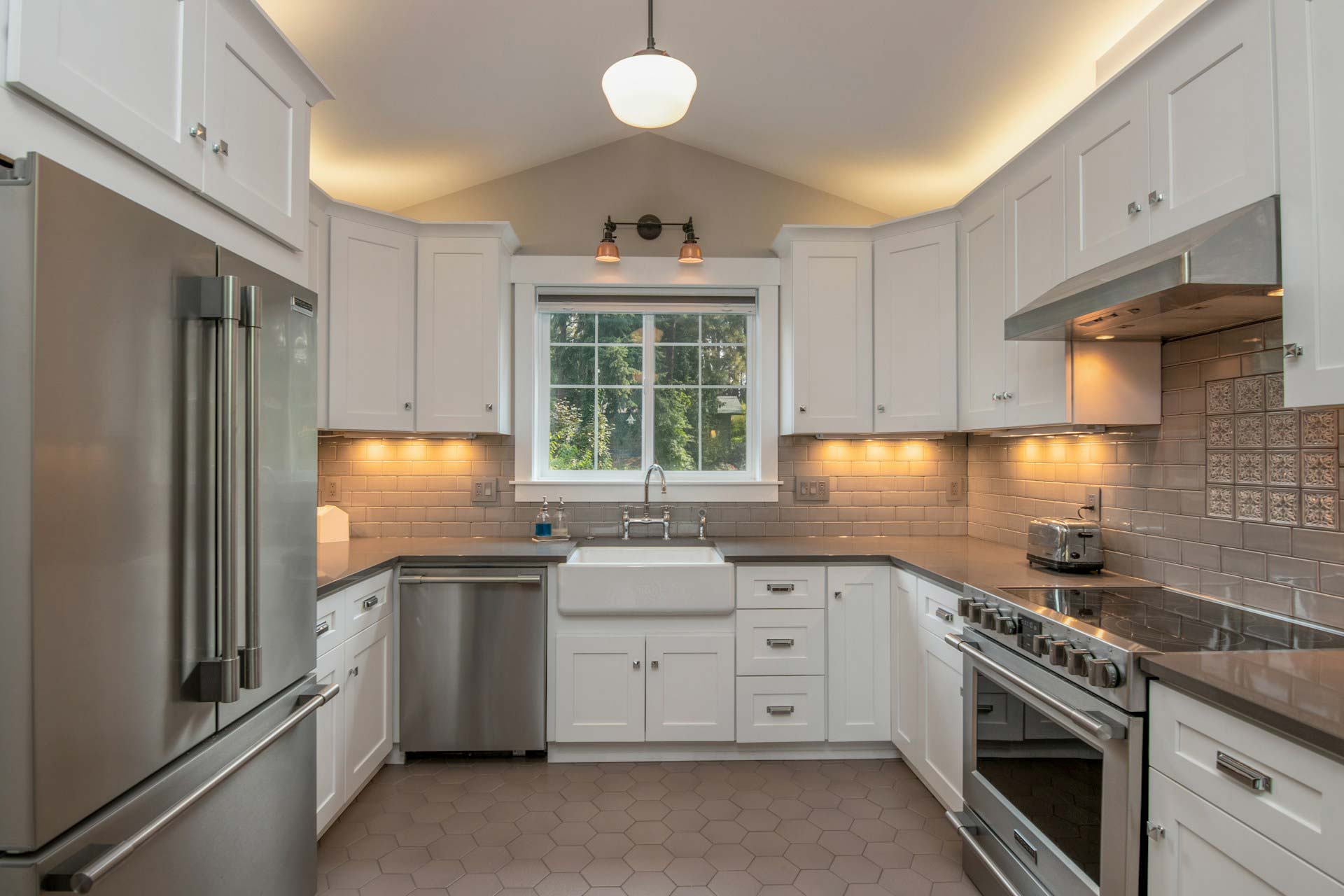 Newly renovated kitchen with tile backsplash