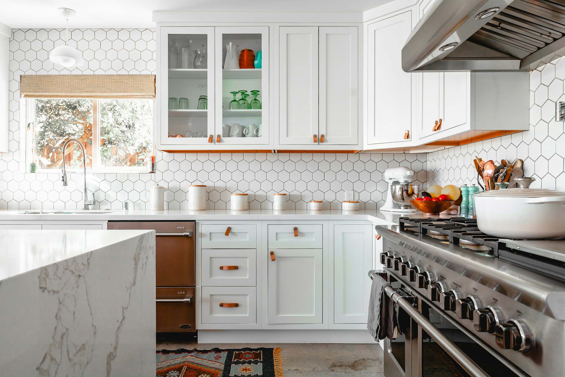 Newly renovated kitchen with honeycomb tile backsplash
