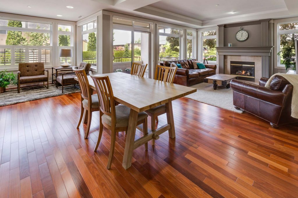Newly renovated living room with dining area and wood floor