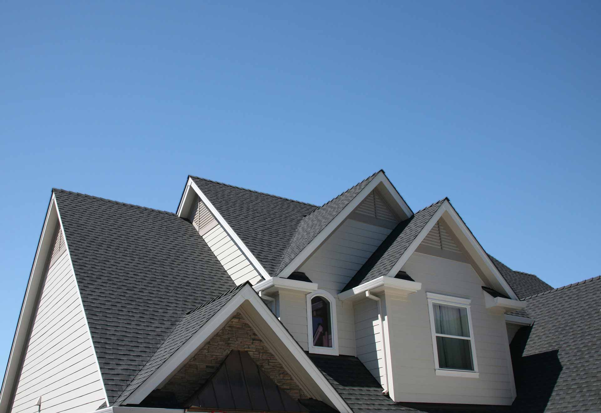 Large house with asphalt shingle roof