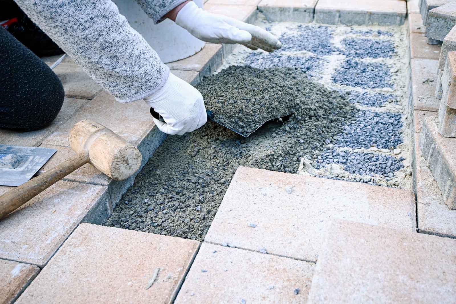 Paving contractor building concrete paver hardscape patio